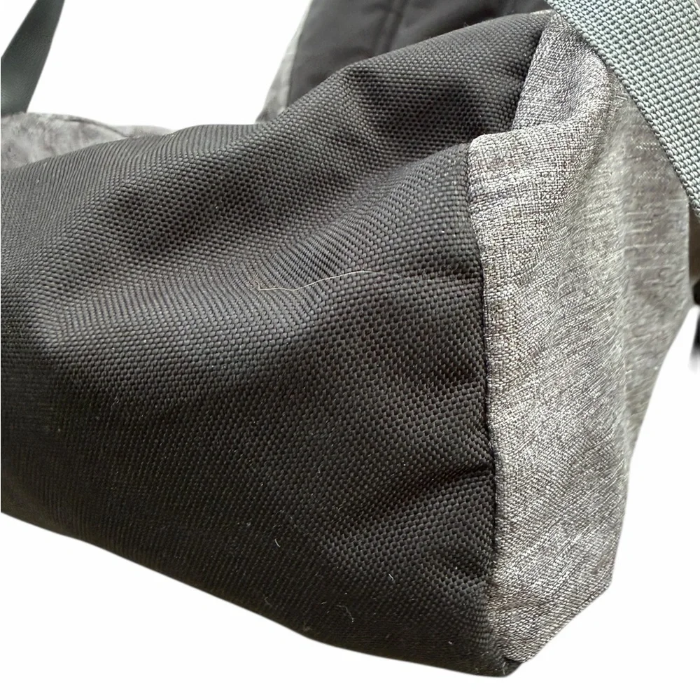 cotopaxi Heather Gray Travel Backpack with Black Base